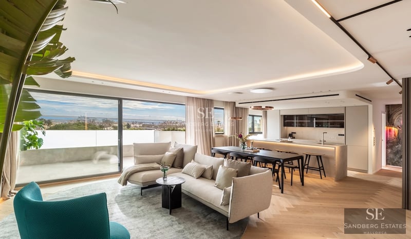Exterior view of a modern villa with a swimming pool, lush garden, and sleek architectural design. White facade and large window panes.