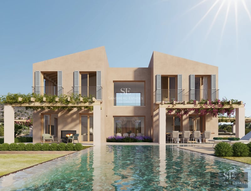 Spacious living room with fireplace, large windows and access to terrace. Modern design with stone and wood accents. Abundant natural light.