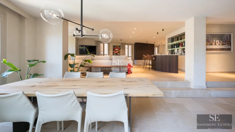 Modern exterior with reflective pool, elegant landscaping, and minimalist architecture. Soft ambient lighting.