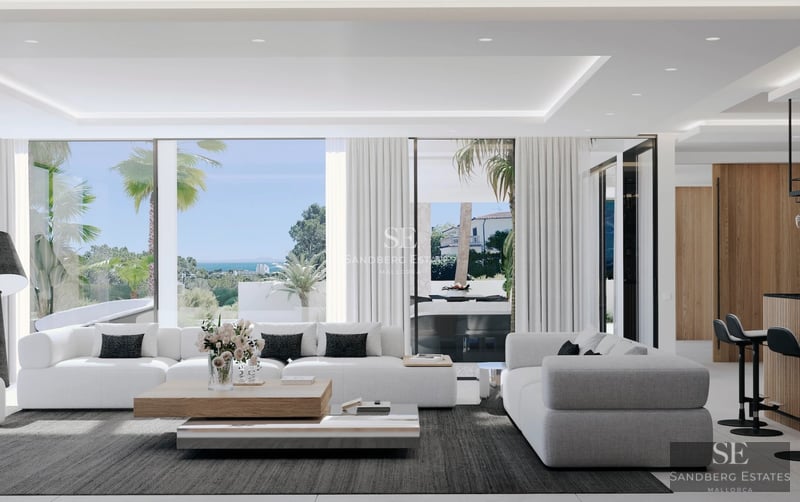 View of a modern villa with an infinity pool, surrounded by gardens and large terraces. Minimalist design and luxurious finishes.