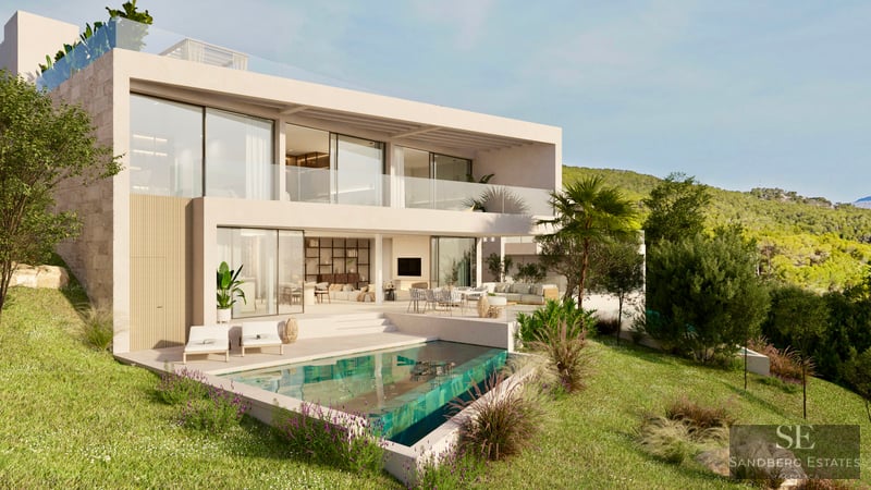 Modern two-story villa featuring a turquoise pool, glass balconies, and lush hillside gardens under a clear sky.
