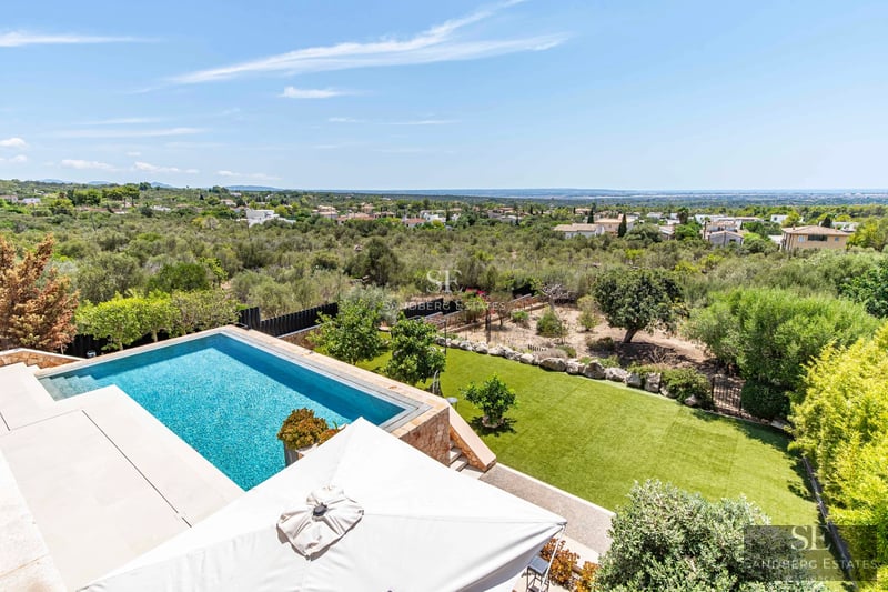 Infinity pool view. Modern design, recessed lights, and large relaxation area.