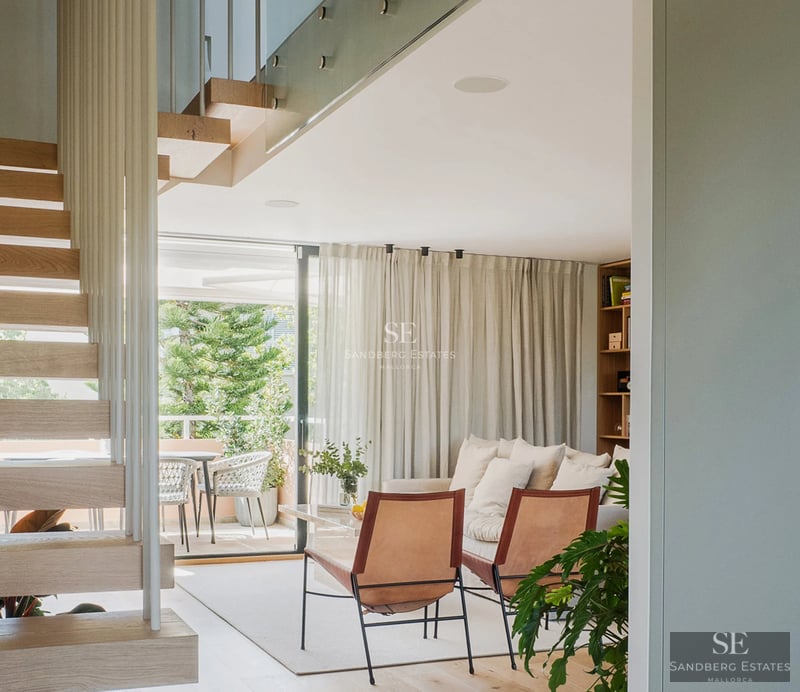 Exterior view of a modern villa featuring an infinity pool, expansive terraces, and lush garden. Contemporary architectural design.