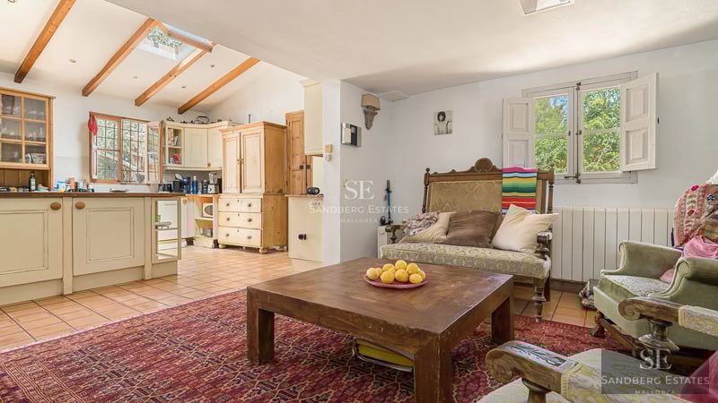 Exterior view of a modern villa with infinity pool, manicured garden, and avant-garde architectural design. Expansive terraces and unobstructed views.
