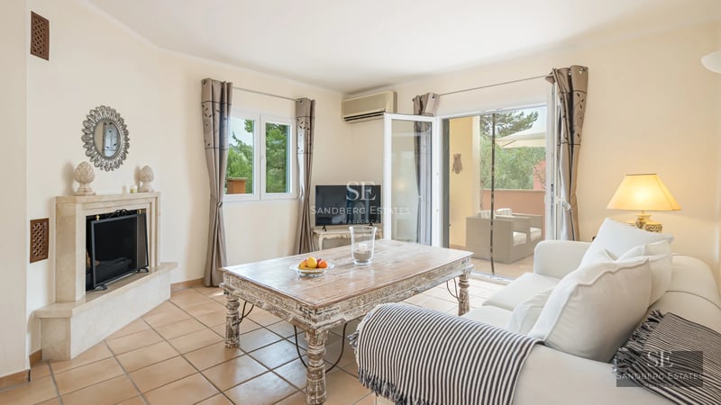 Exterior of modern home with pool, large garden, expansive windows, and minimalist design. Natural lighting is highlighted.