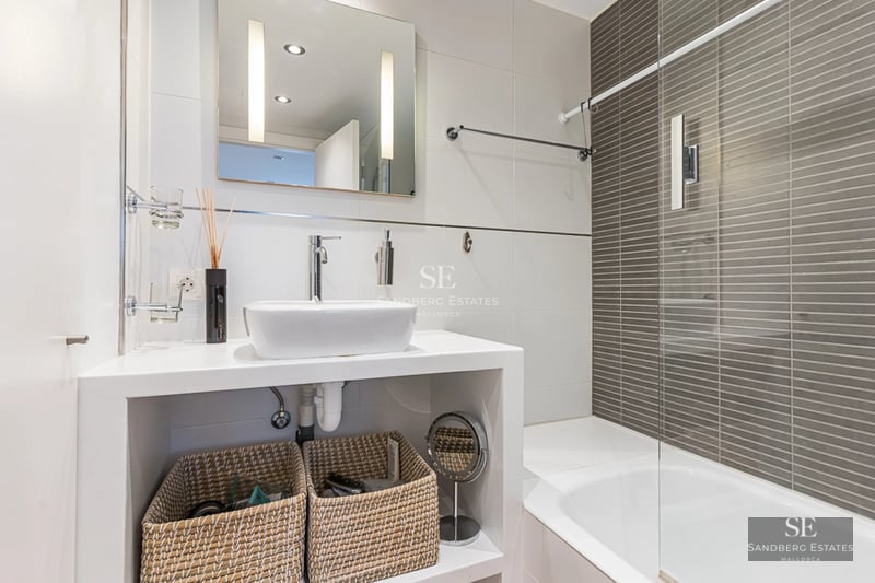 Exterior view of a modern villa with pool, garden and terrace. Minimalist architecture and large windows.