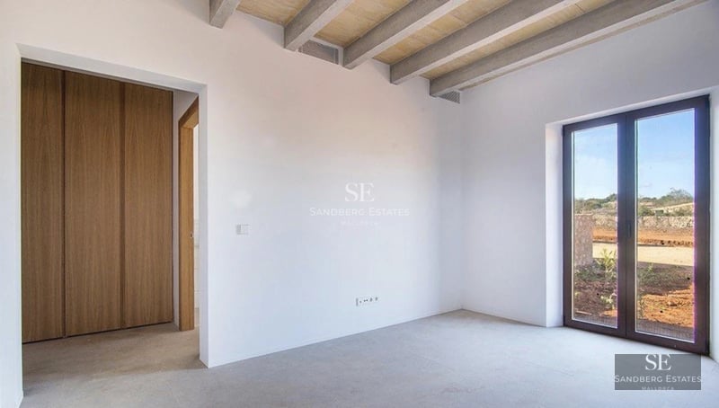 Spacious terrace with pool, sun loungers, and panoramic views. Modern, minimalist architecture with large windows and landscaped surroundings.