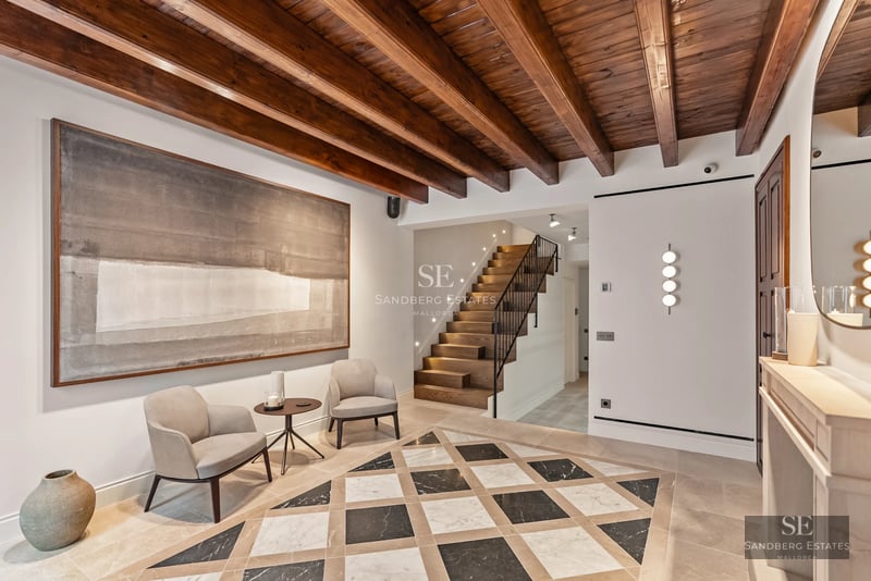 Spacious terrace with infinity pool, sun loungers, and panoramic views. Modern architecture with clean lines and floor-to-ceiling windows.