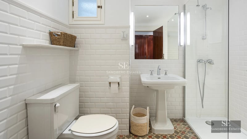 Exterior view of modern villa featuring a reflective pool, manicured garden, minimalist architecture and large windows. Soft lighting.