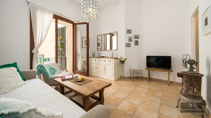 Exterior view of a modern house with a pool, garden, and large window. Minimalist design with high-quality materials.