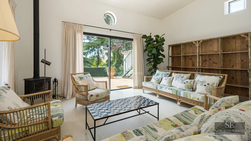 Aerial view of modern villa featuring a swimming pool, garden, and spacious areas. Contemporary design and high-quality finishes.