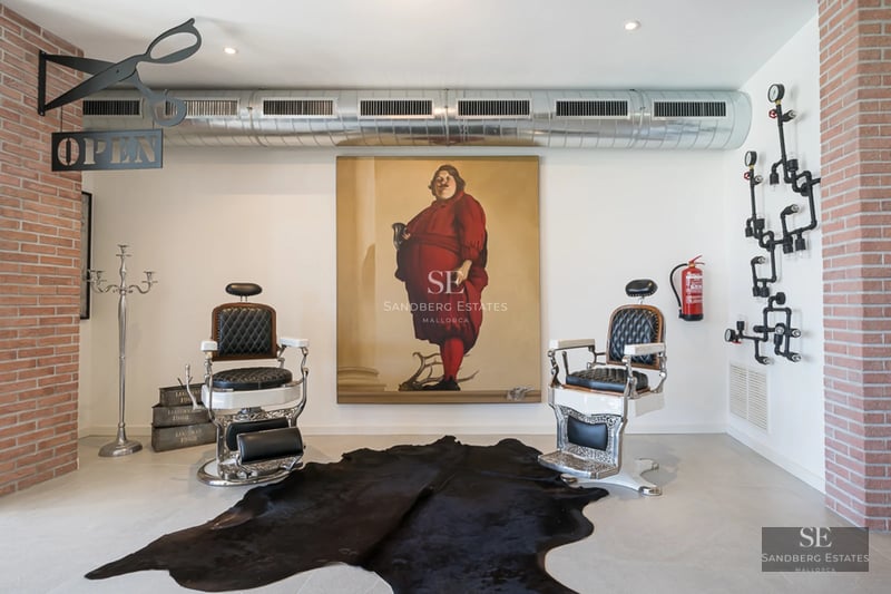 Panoramic view of a luxurious property featuring an infinity pool, expansive terraces, and lush gardens. Modern and elegant architectural design.