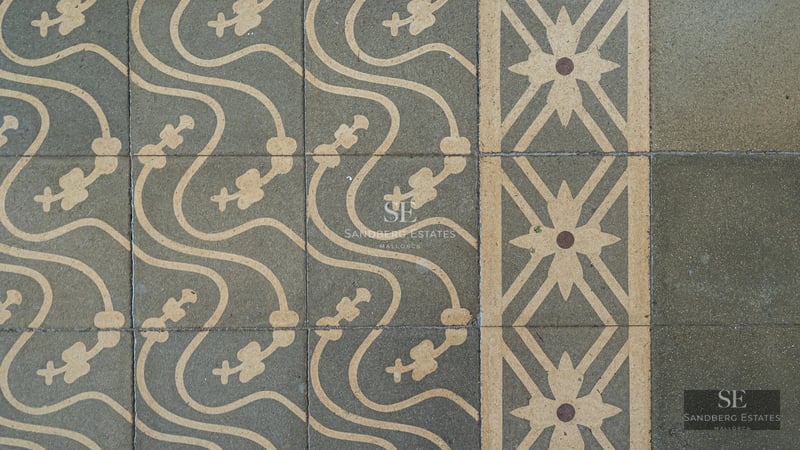 Exterior view of a modern villa featuring an infinity pool, large windows, and lush garden. Minimalist architecture and manicured landscaping.