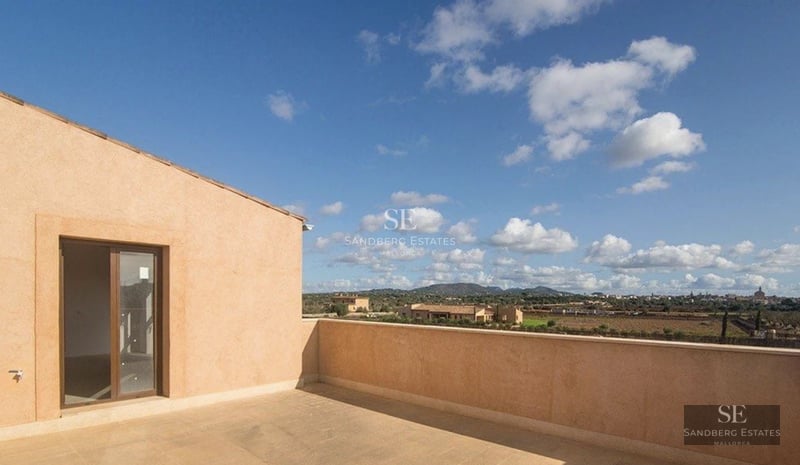 Exterior view of a modern villa with infinity pool, spacious terraces, and lush greenery. Contemporary design with high-end finishes.