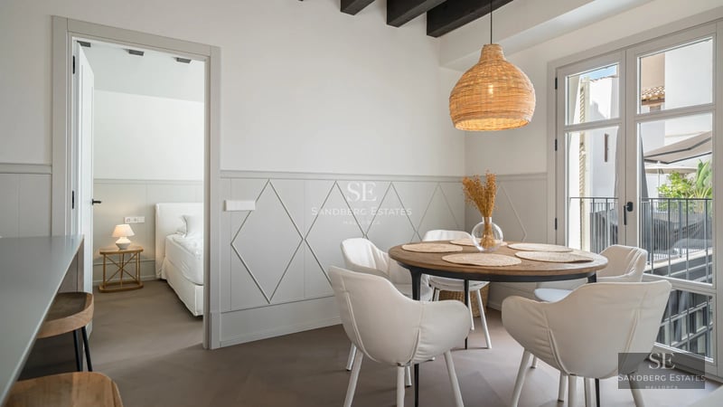 Spacious terrace with swimming pool and panoramic views. Modern design featuring glass railing and stylish furniture.