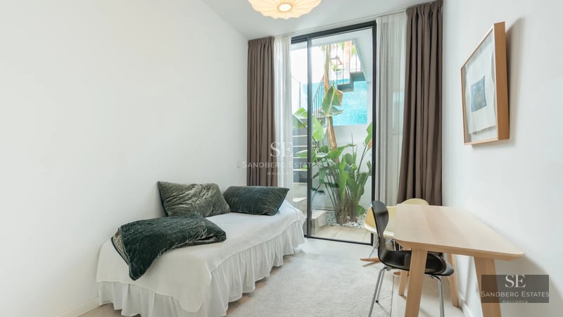 Exterior view of a modern villa with a pool, manicured garden and minimalist architecture. Soft lighting and predominantly neutral tones.