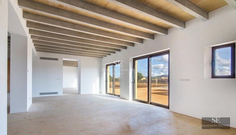 Exterior view of a modern villa featuring a pool, large windows, lush garden, and minimalist architectural design. Natural lighting.
