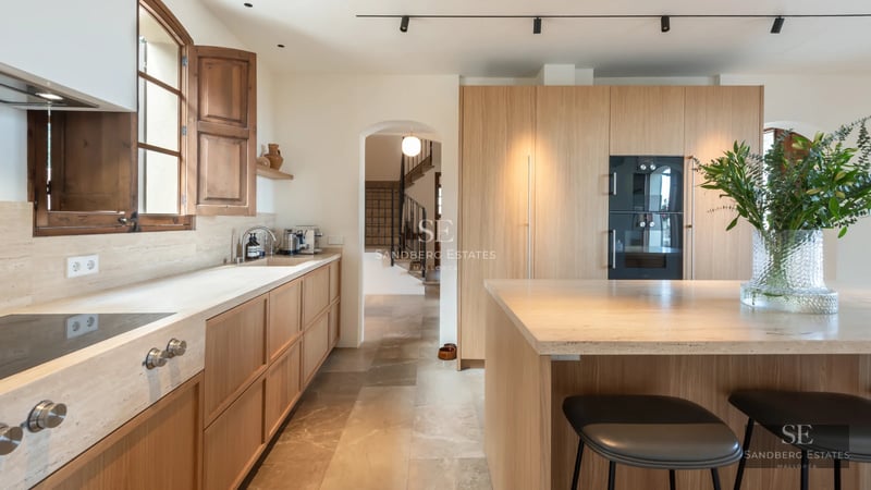 Exterior view of a modern villa with pool, large garden, and sleek architectural design. Abundant natural lighting.