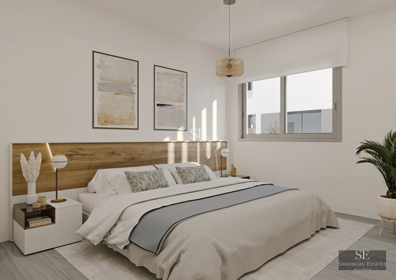 Exterior view of modern home with infinity pool and spacious terraces. Minimalist design with large windows and lush vegetation.