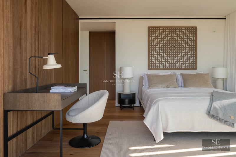 Exterior of modern villa with infinity pool. Minimalist architecture, large windows, lush garden. Warm lighting at dusk.