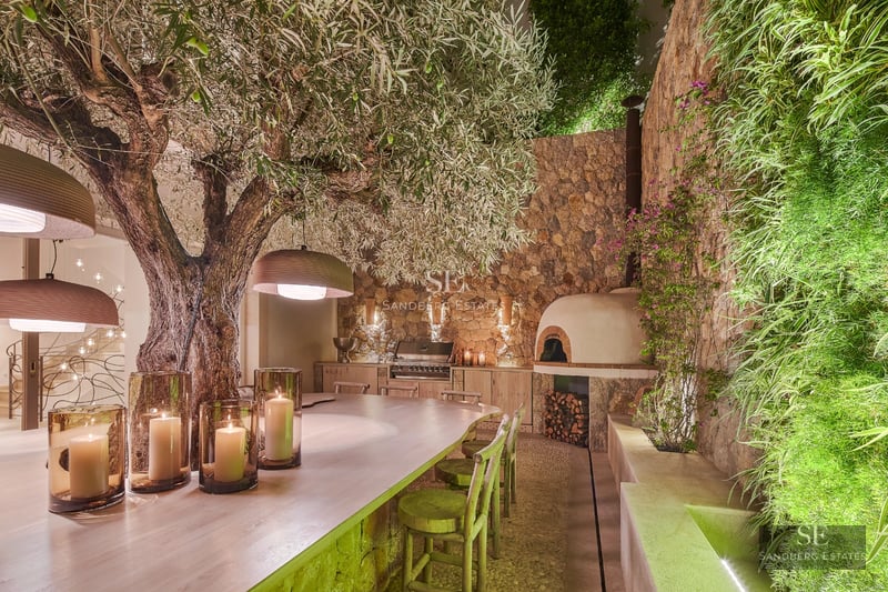 Exterior view of modern villa featuring infinity pool, lush garden and minimalist architectural design. Large windows.