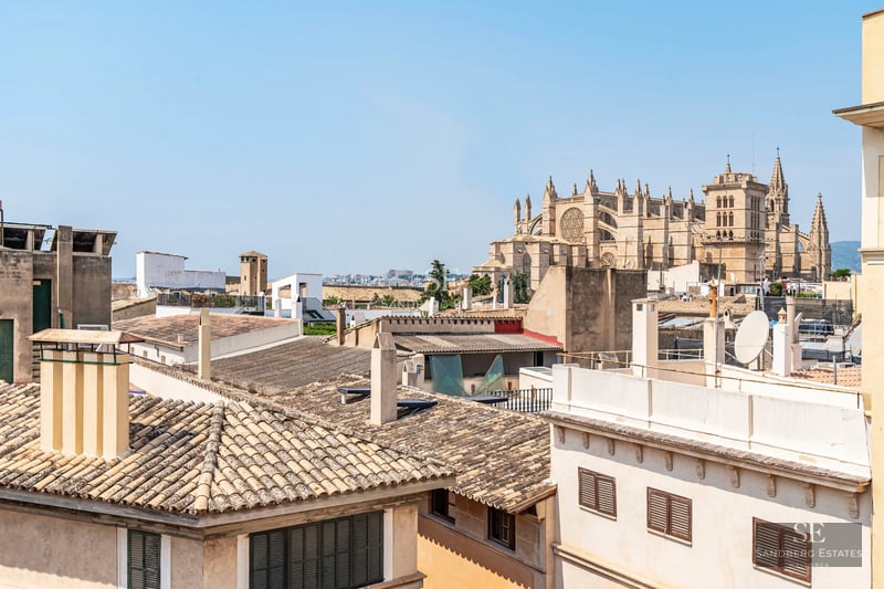 Exterior view of a modern villa featuring a pool, manicured garden, and expansive living spaces. Contemporary architecture and sleek design.