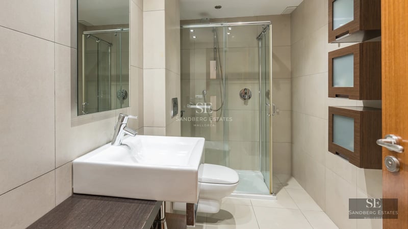 Pool view. Modern architecture, clean lines. Large windows, natural light. Wood and stone details. Lush garden.