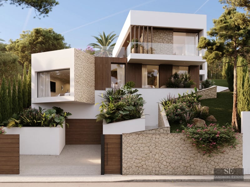 Spacious living room with large windows, sea view, modern furniture and a neutral color palette. Leather sofa, soft rug and natural light.