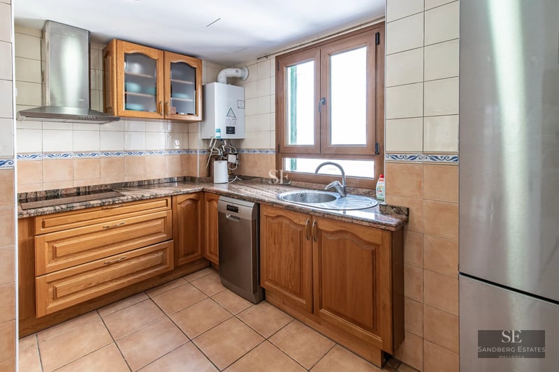 Exterior view of a modern villa with pool, surrounded by greenery. Minimalist architecture, large windows and sunny terraces.