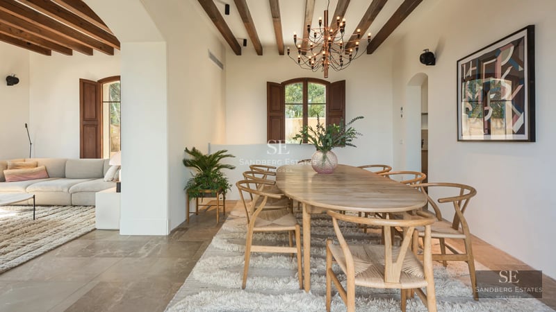 Exterior view of modern villa with infinity pool, expansive terraces, minimalist design, and lush greenery. Luxury and comfort.