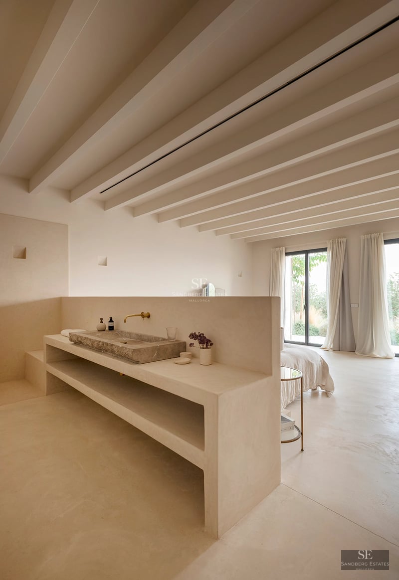 Spacious balcony with panoramic sea view. Modern design, glass railing, and stylish outdoor furniture. Ideal for relaxing and enjoying the view.