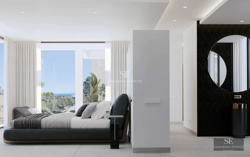 Spacious living room featuring floor-to-ceiling windows, sea views, and modern furniture. Bright and elegant interior.