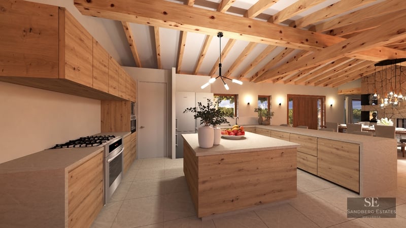 Spacious kitchen featuring exposed wood beams, light oak cabinetry, and a large central island.