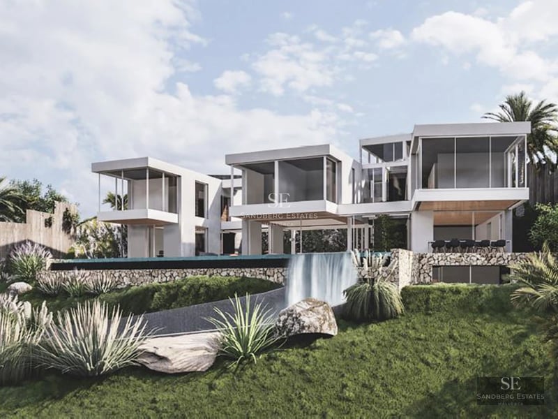 Exterior view of a modern villa featuring a pool and large garden. Minimalist architecture with large windows and high-quality finishes.