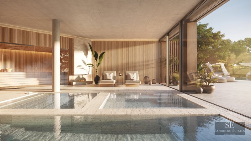 Modern indoor spa with stone pools, wooden slatted walls, lounge chairs, a fireplace, and a glass-enclosed sauna.