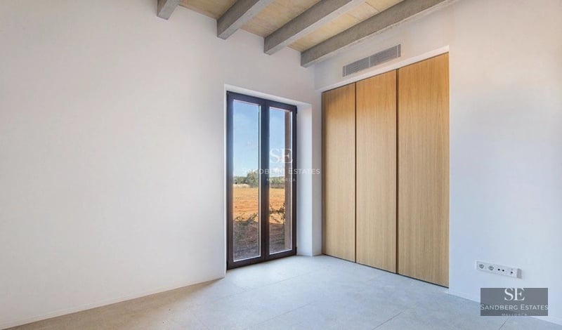 Exterior view of a modern villa with a pool, landscaped garden, and contemporary architecture. Soft ambient lighting.