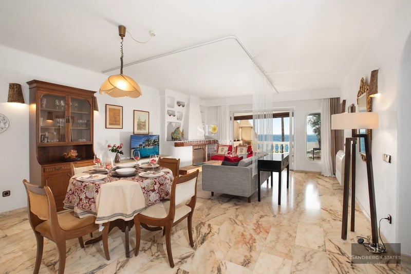 Modern terrace with infinity pool and panoramic sea views. Elegant furniture, minimalist design, and relaxing atmosphere.