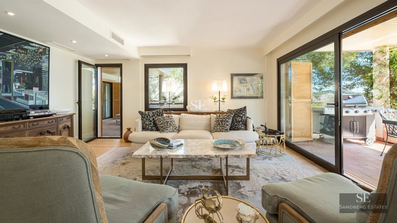 Spacious terrace with infinity pool, sun loungers, and panoramic views. Modern, elegant architecture. Relaxing and luxurious atmosphere.