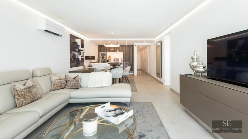 Modern villa featuring a pool, lush garden, and expansive living areas. Contemporary design, abundant natural light.