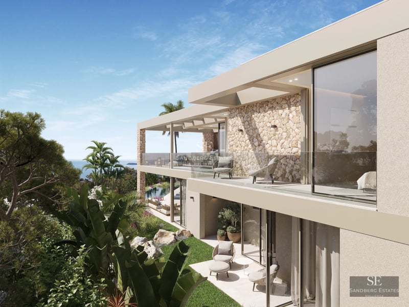 Expansive terrace with infinity pool, elegant sun loungers, and panoramic sea views. Modern design featuring clean lines and luxurious furnishings.