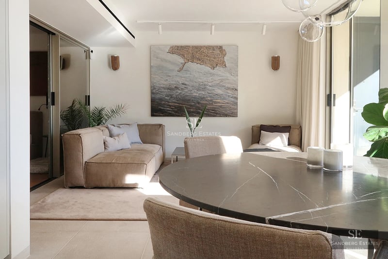 Spacious terrace with infinity pool and ocean views. Modern design, stylish outdoor furniture, and minimalist architecture.