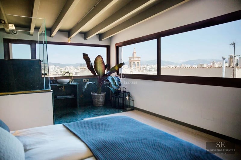 Panoramic view of a modern home with a turquoise pool, lush garden, and minimalist architecture. Large panoramic windows.