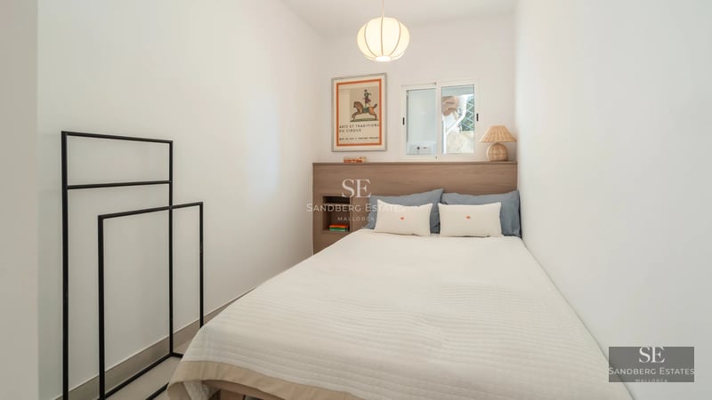 Spacious living room with panoramic windows and sea views. Modern, elegant, and bright design with high-end furniture.