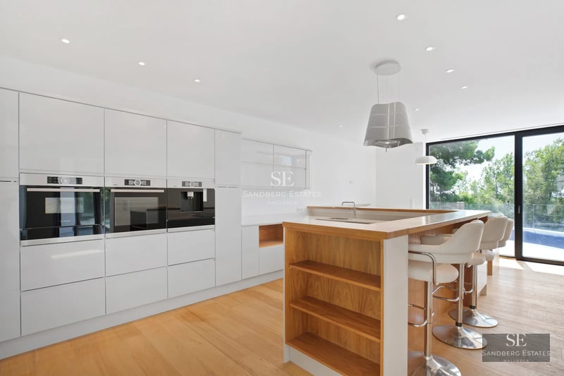Exterior view of a modern villa with reflecting pool. Minimalist architecture, clean lines, and abundant natural light.
