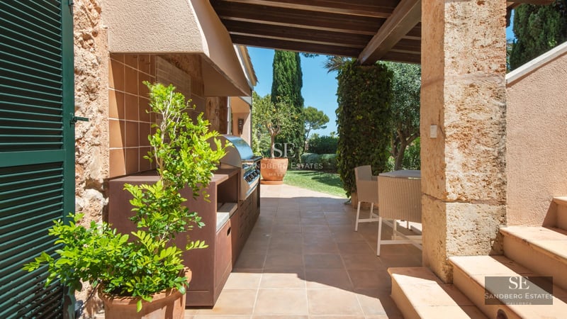 Modern facade featuring a pool, expansive windows, and lush garden. Minimalist architecture with clean lines and natural lighting.