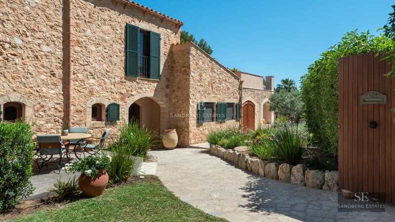 Spacious terrace with panoramic sea views. Modern and elegant furniture. Glass railing and minimalist design.