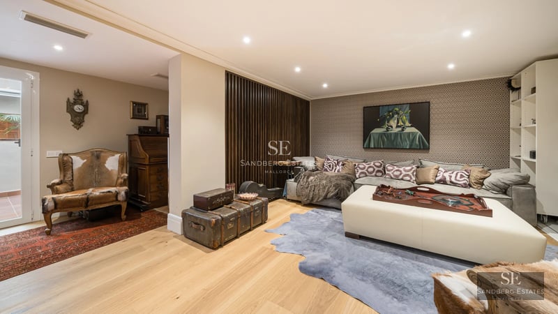 Exterior view of a modern villa featuring a pool, garden, and large windows. Minimalist and elegant architectural design.