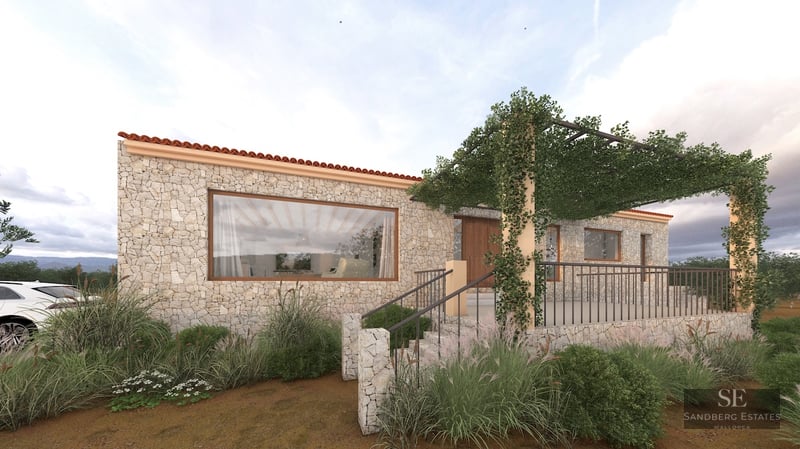 Modern stone villa facade featuring a vine-covered pergola, large windows, and natural Mediterranean landscaping.