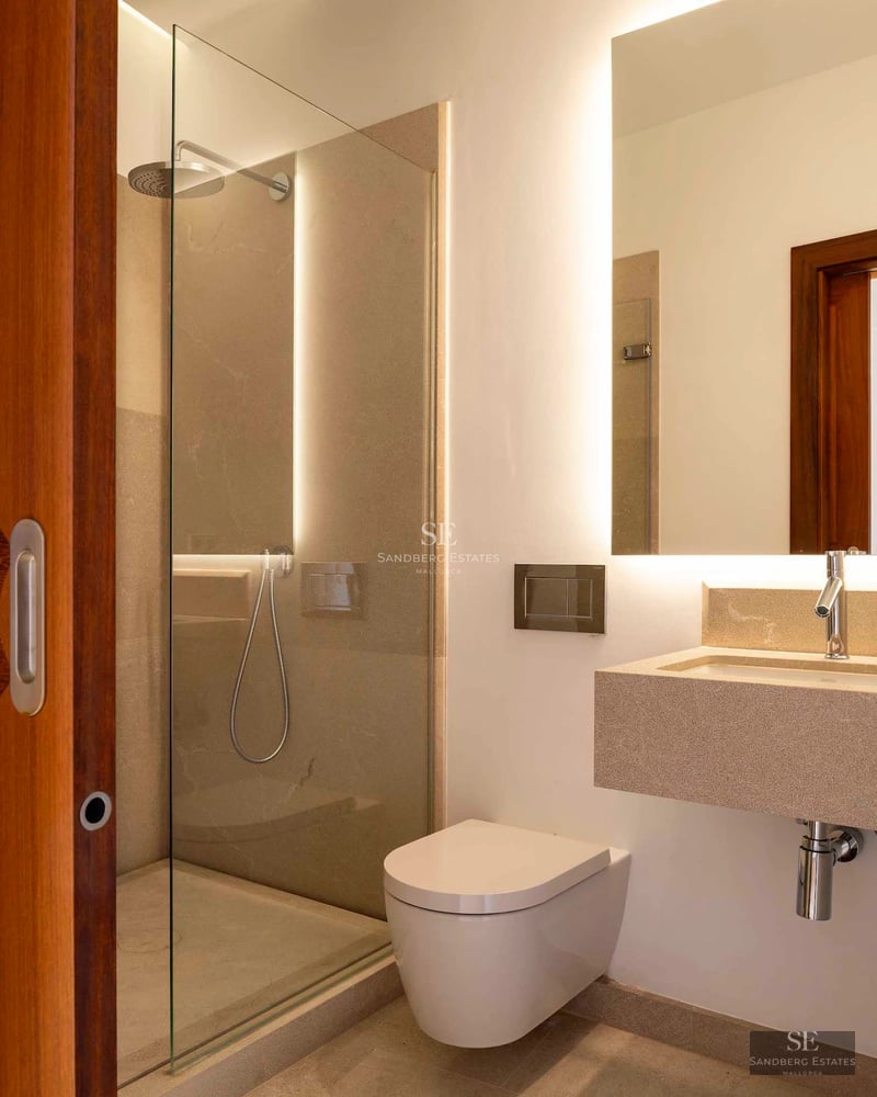 Spacious living room with panoramic sea views. Modern design, natural lighting and elegant furniture.