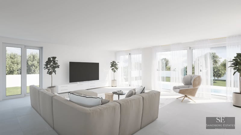 Spacious balcony with sea views from a modern apartment. Glass railing, stylish furniture, and minimalist design.